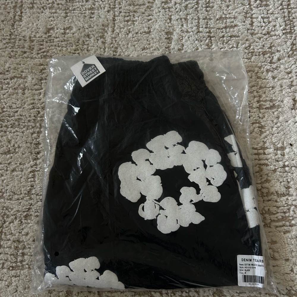 Denim Tears Black Athletic Shorts with White Floral Design